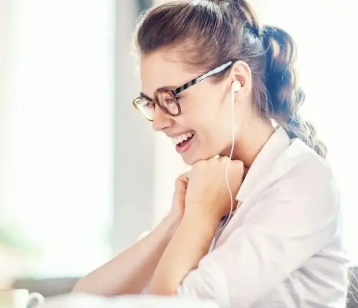 Student smiling with headphones