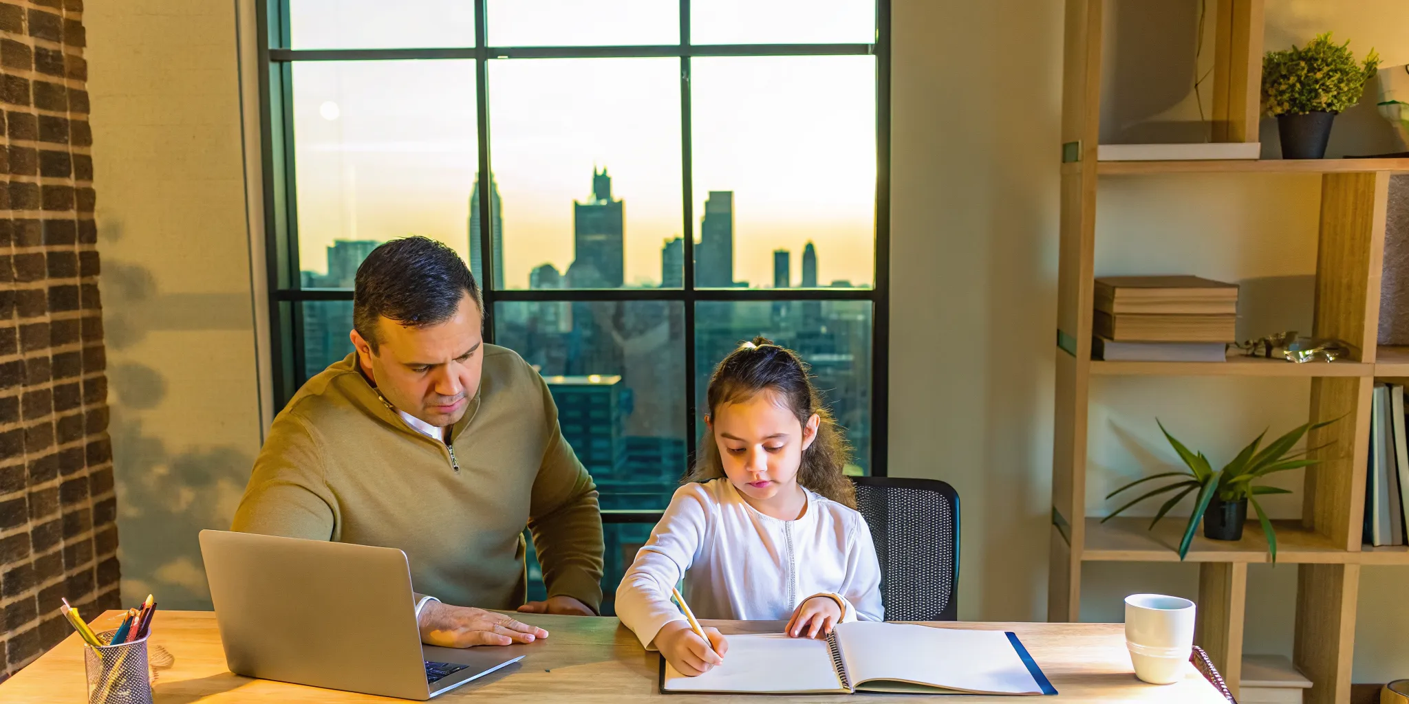 A father helps his daughter with Atlanta private school test prep.